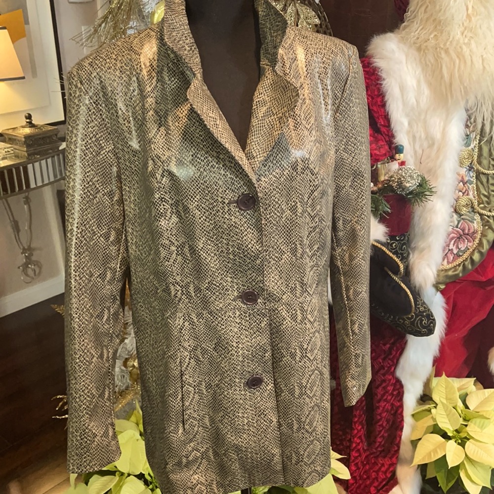 A woman’s size large leather snake skin blazer